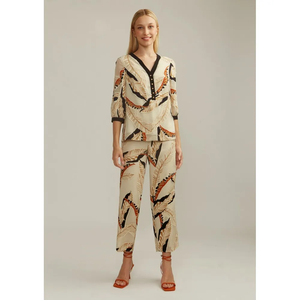 Pantalón ALBA CONDE beige estampado hojas
