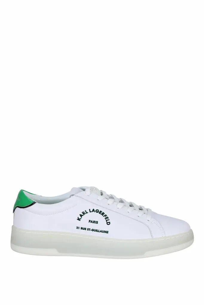 Zapatillas blancas con detalle verde y logo 